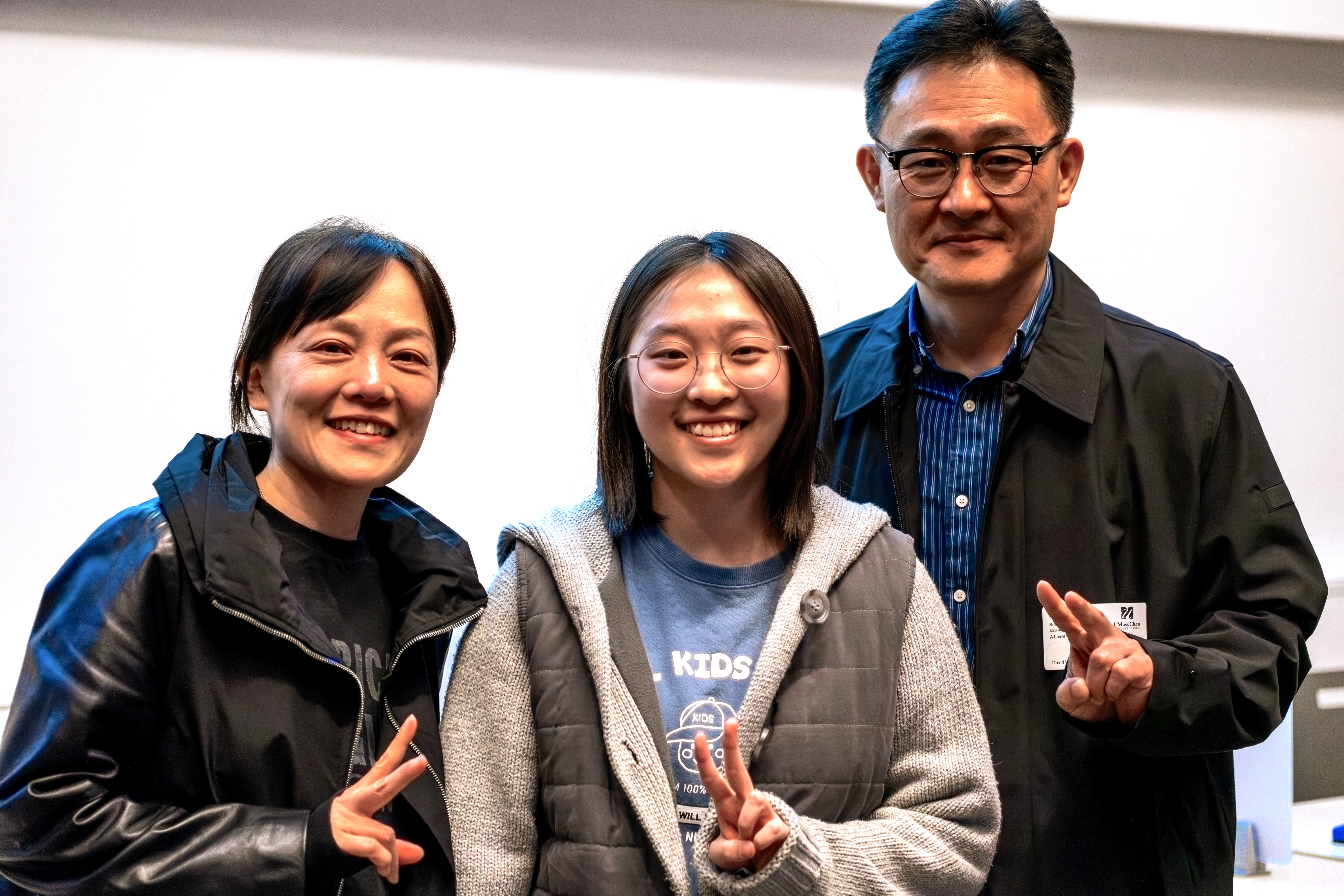 Rebecca Ahn and her parents