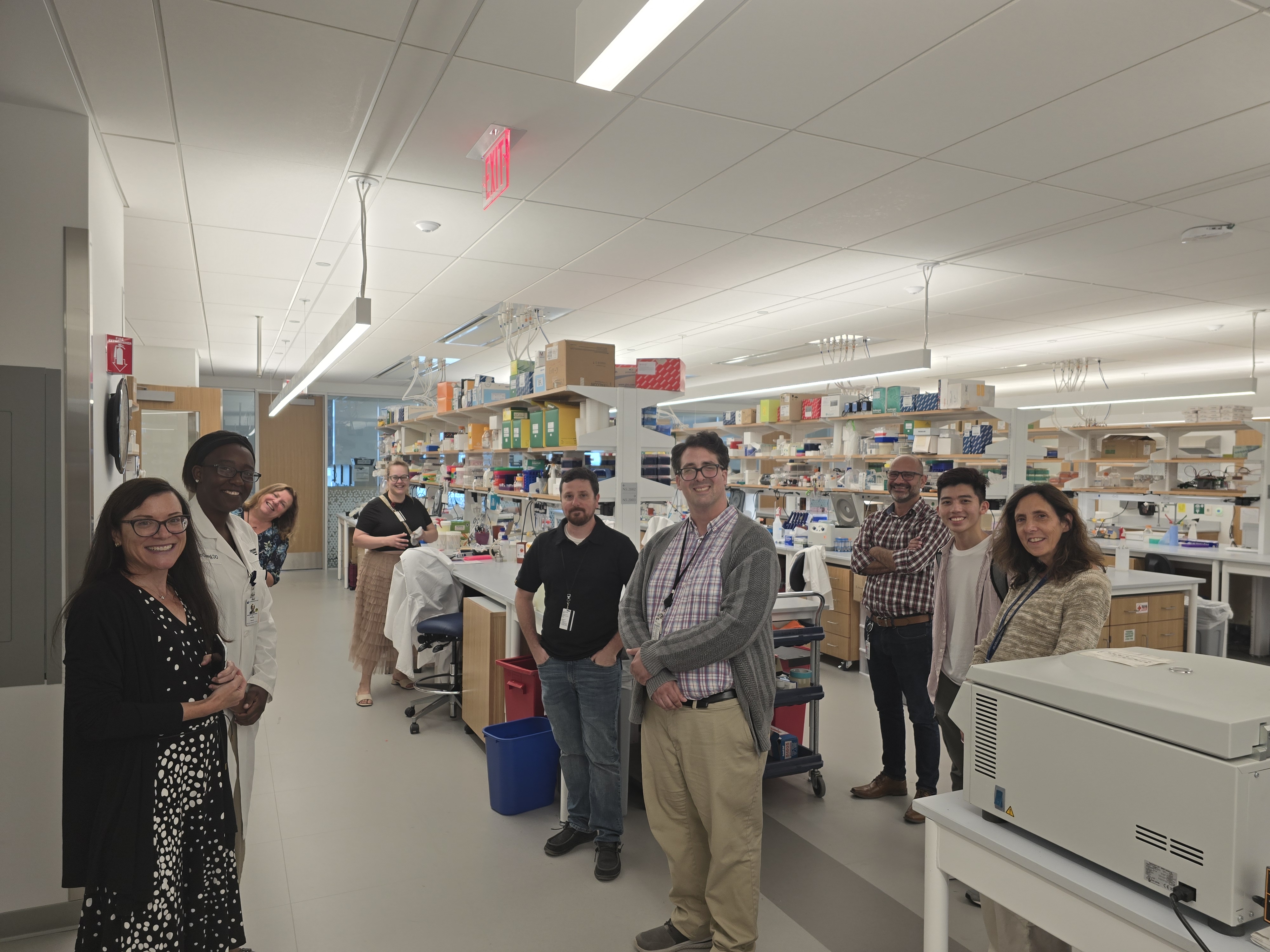 A photo of tour guests being guided by Daryl Bosco through the research lab space