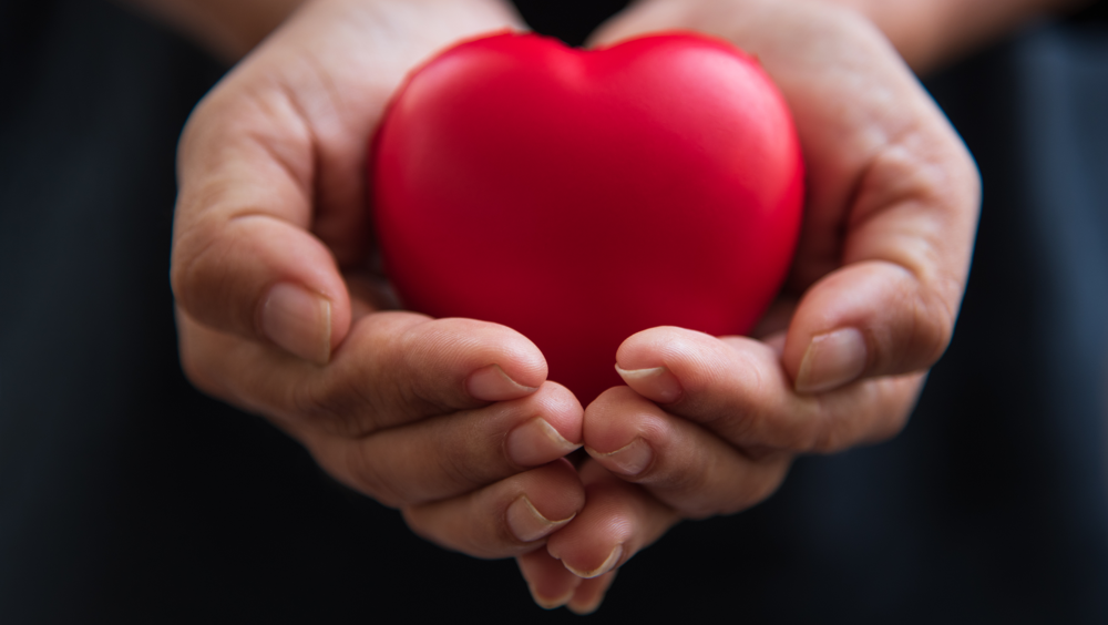 Close-Up-Hands-Red-Heart.png