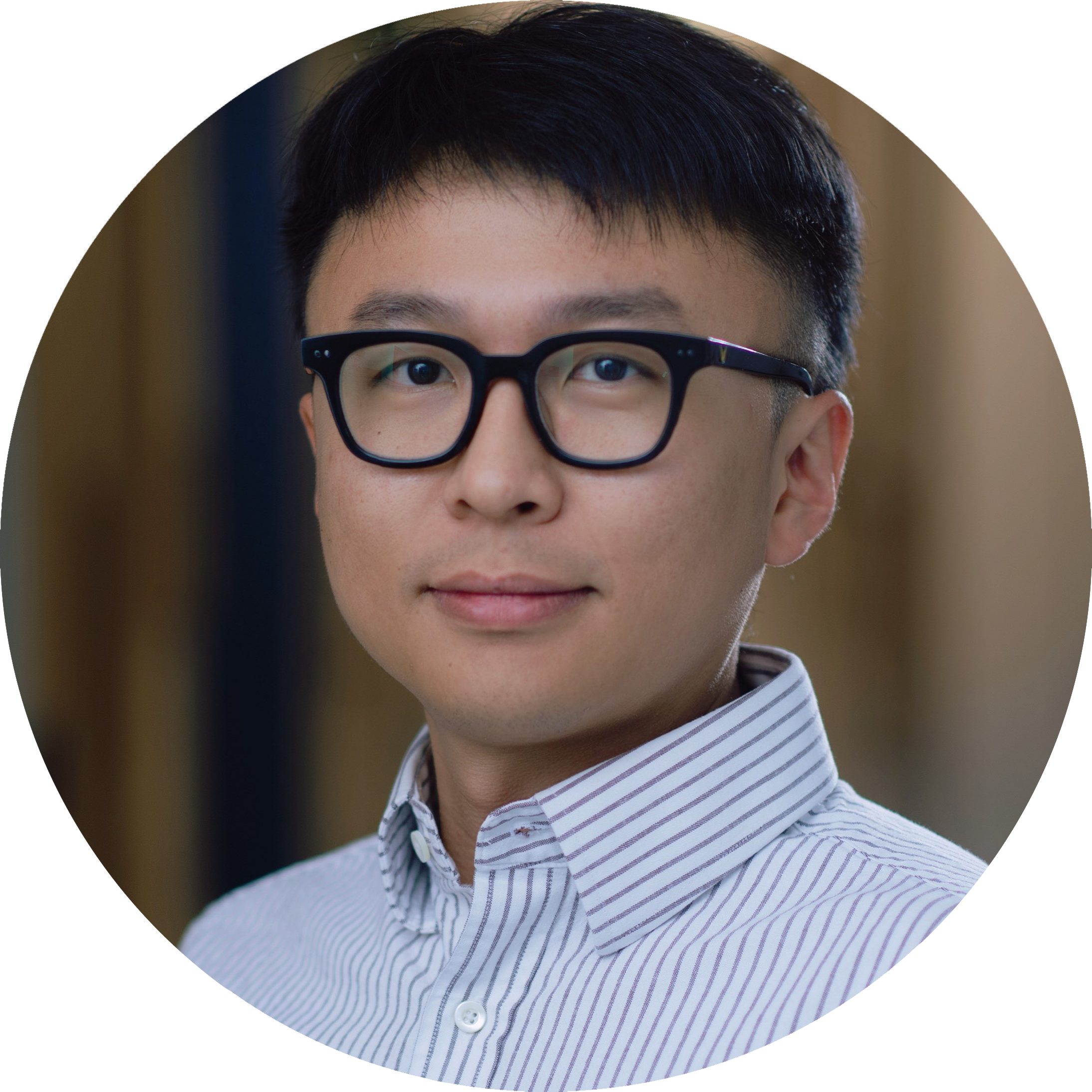 A headshot of Yu Qing, wearing glasses and wearing a light striped shirt, looking at the camera with a neutral expression.