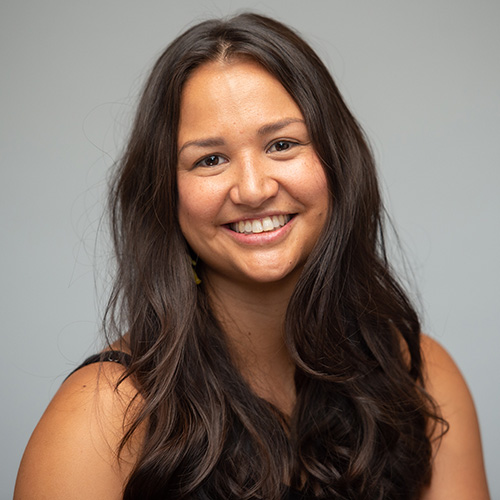 light brown skinned woman with long dark hair