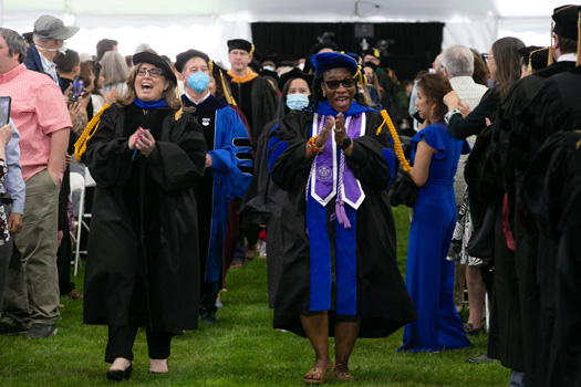 UMass Chan faculty marshals Lela Giannaris, PhD and Rose Kronziah-Seme, PhD, lead the ceremony.