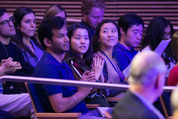 GSBS students who have recently passed the qualifying exam applaud their classmates.