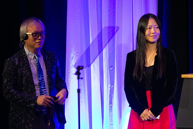 Zhiping Weng, PhD, (right), is invested as the Li Weibo Chair in Biomedical Research. Li Weibo is pictured at left.