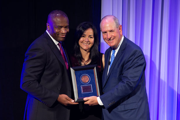 Imoigele Aisuku, MD, Milagros Rosal,PhD, and Chancellor Collins