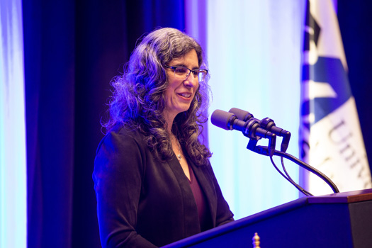 Dean Mary Ellen Lane addresses the doctoral candidates in the Morningside Graduate School of Biomedical Sciences.