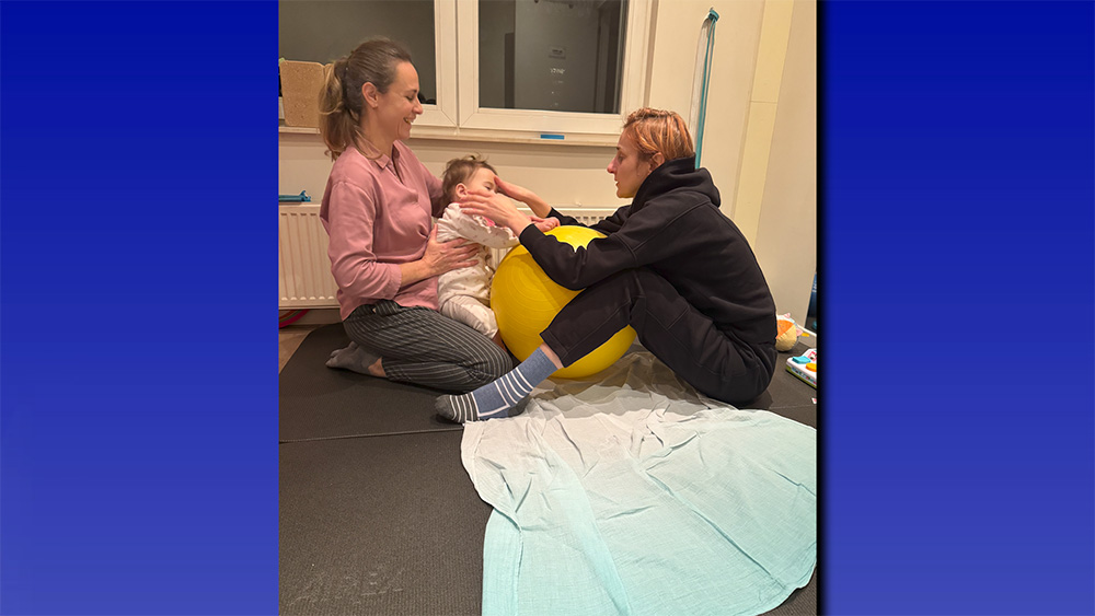 A physical therapist, Catherine and her mother, Tamara Radivilova, during a therapy session. 