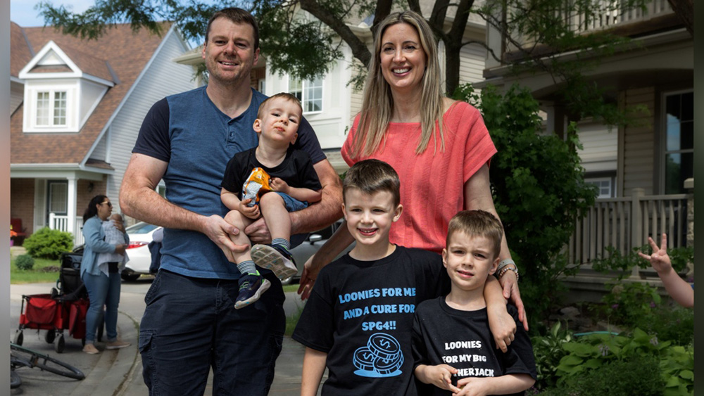 Richard, Tommy, Jack, Anna and Scott Laidlaw standing outside together