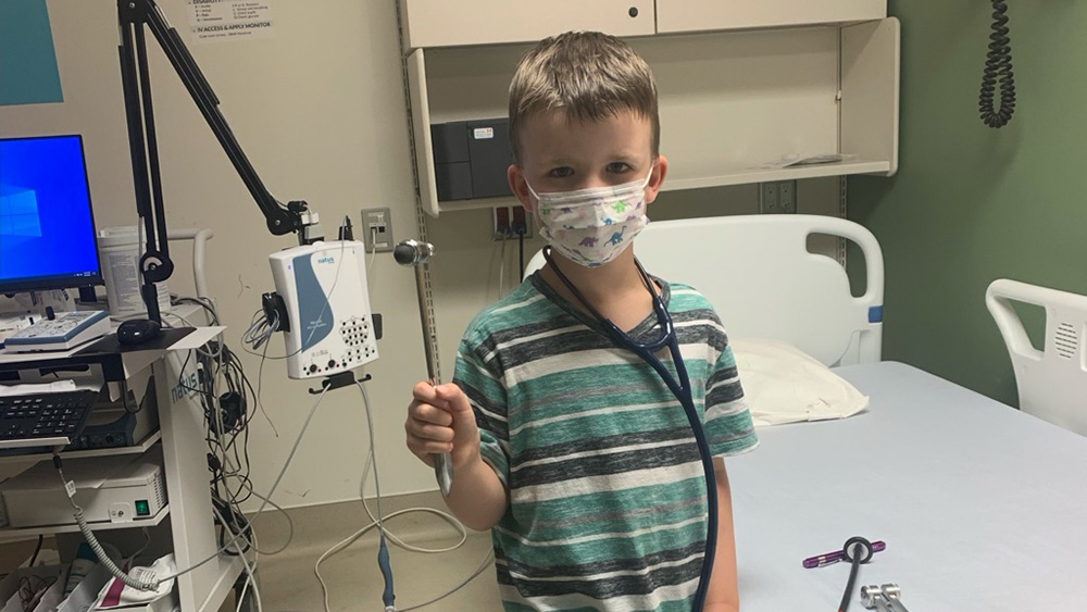 Jack wears a mask during a doctor’s visit