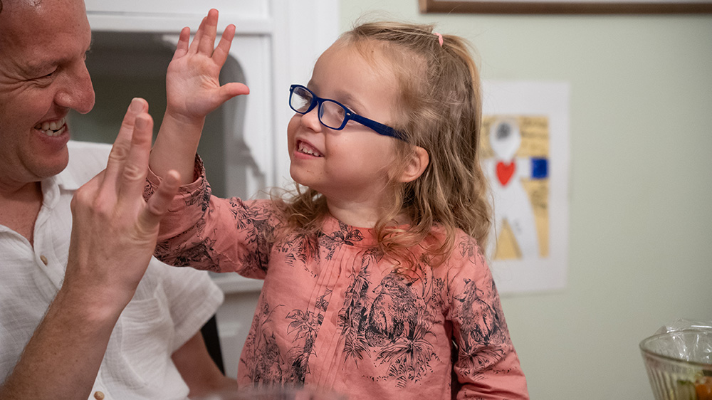 Lee and Noa Greenwood exchange high-fives