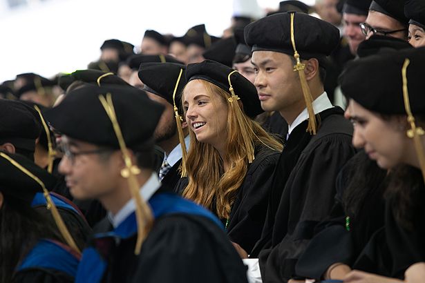 Brittany Berk and her School of Medicine classmates listen to Mullur speak.