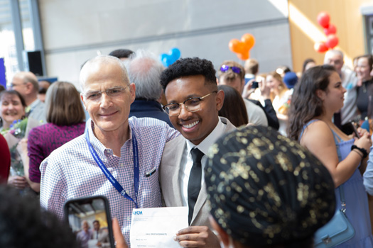 Rodney Bruno, right, with Learning Community Mentor Michael Ennis, MD. Bruno will train in ob/gyn at Boston University Medical Center.