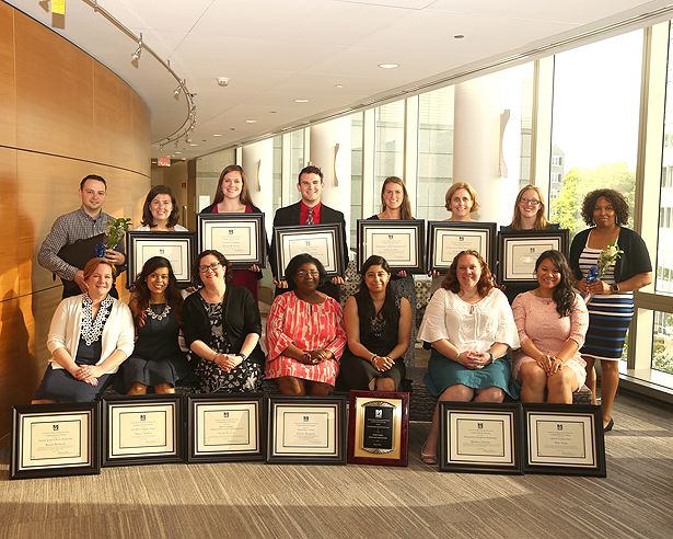 Award winners gather for a group photo.