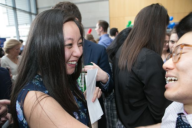 Camilla Yu celebrates her match with a friend.