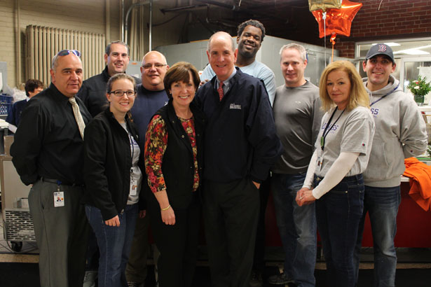 Members of the UMass Chan Medical School team volunteered to distribute food during the Veterans Inc. Harvest Day event.