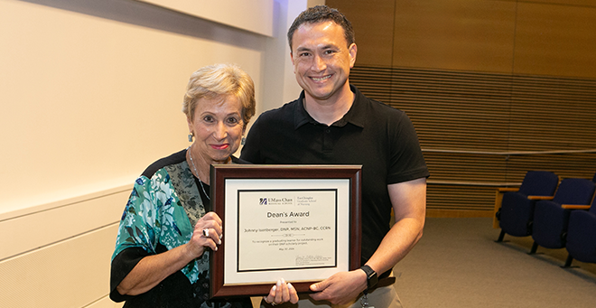 Dean Joan Vitello-Cicciu standing next to Johnny Isenberger